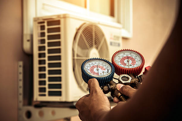 Professional Air Conditioning Service technician working in Albany, KY